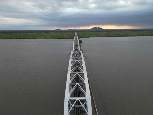 Steel bridge over water, symmetrical