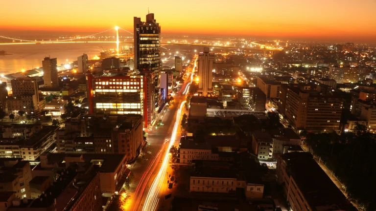 City lights glow at dusk