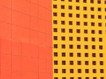 Red and yellow walls with geometric square patterns