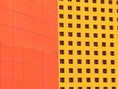 Red and yellow walls with geometric square patterns