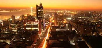 City lights glow at dusk